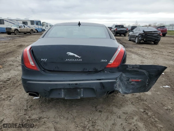 2015 Jaguar XJ with VIN SAJWA1CZ1F8V75808, listed as a Copart auction lot 44436825 with 0 mi miles and Salvage Title. Bid and sale history available at carsss.com. Image 6.
