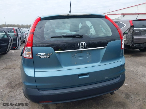 2014 Honda CR-V LX with VIN 2HKRM3H32EH517323, listed as a IAAI auction lot 42020715 with 121,389 mi miles. Bid and sale history available at carsss.com. Image 16.