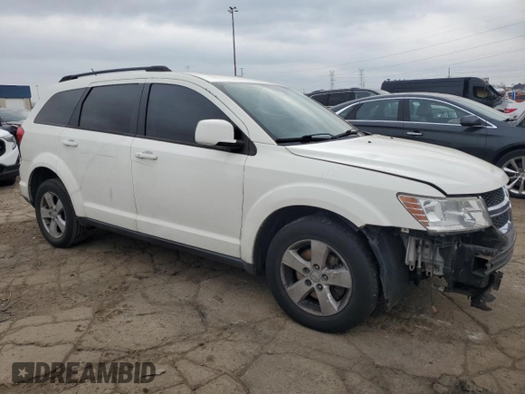 2012 Dodge Journey SXT with VIN 3C4PDCBG0CT331294, listed as a Copart auction lot 52066075 with 216,470 mi miles and Clean title. Bid and sale history available at DreamBid. Image 4.