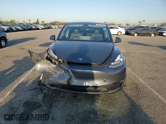 2022 Tesla Model Y Long Range z VIN 7SAYGAEE9NF366382, wystawiony jako Copart lot #52179515 z przebiegiem 41 654 mil mil oraz Szkoda całkowita • Salvage title. Historia ofert i sprzedaży dostępna na DreamBid. Obrazek 11.
