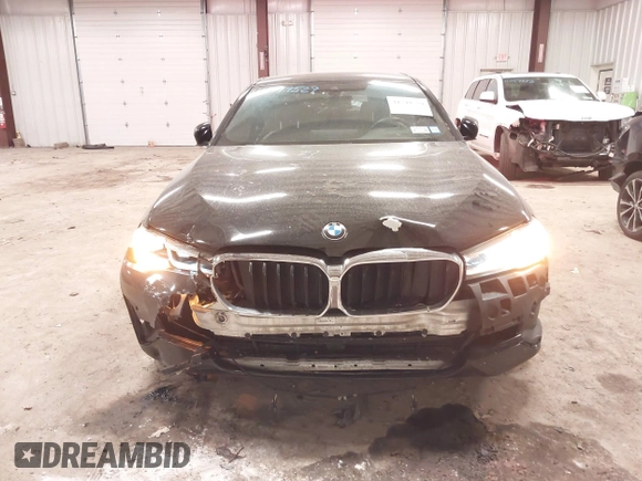 2021 BMW 5 Series 530i xDrive with VIN WBA13BJ09MCF64918, listed as a IAAI auction lot 41749529 with 90,076 mi miles and . Bid and sale history available at carsss.com. Image 12.