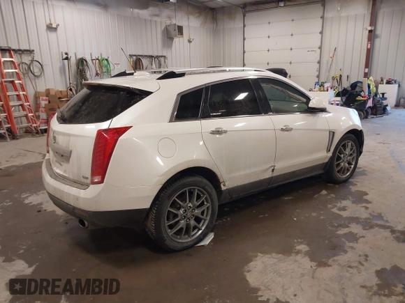2015 Cadillac SRX Premium Collection with VIN 3GYFNGE32FS564168, listed as a IAAI auction lot 41355787 with 182,949 mi miles. Bid and sale history available at carsss.com. Image 4.