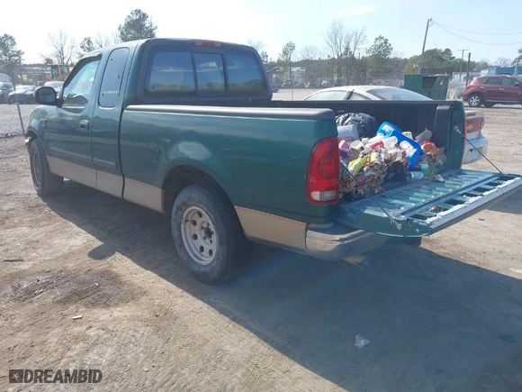 1999 Ford F-150 Work Series with VIN 1FTRX17W6XNB82190, listed as a IAAI auction lot 41597968 with NaN miles. Bid and sale history available at carsss.com. Image 3.