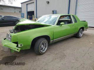1981 Oldsmobile Cutlass z VIN 1G3AR47F1BR483296, wystawiony jako Copart lot #76765774 z przebiegiem 34 550 mil mil oraz Szkody całkowita. Historia ofert i sprzedaży dostępna na DreamBid. Obrazek 1.