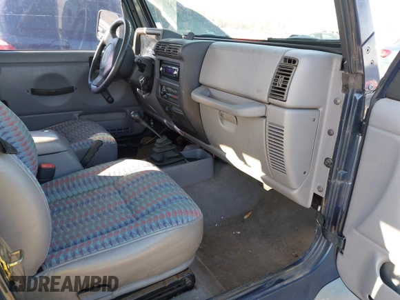 1997 Jeep Wrangler Sport with VIN 1J4FY19S1VP462136, listed as a IAAI auction lot 41766868 with 130,980 mi miles. Bid and sale history available at carsss.com. Image 5.