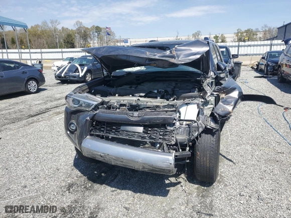 2021 Toyota 4Runner TRD Off Road with VIN JTEPU5JR0M5877962, listed as a Copart auction lot 50973355 with 61,539 mi miles and Salvage Title. Bid and sale history available at carsss.com. Image 5.
