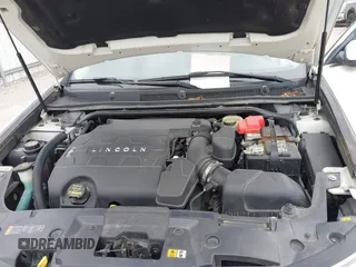 2013 Lincoln MKS with VIN 1LNHL9DKXDG604710, listed as a IAAI auction lot 42001875 with 117,724 mi miles and . Bid and sale history available at DreamBid. Image 10.