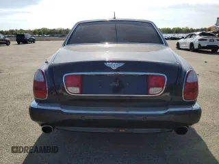 2005 Bentley Arnage R z VIN SCBLC37F15CX10517, wystawiony jako Copart lot #54303364 z przebiegiem 116 865 mil mil oraz Szkody całkowita. Historia ofert i sprzedaży dostępna na DreamBid. Obrazek 6.