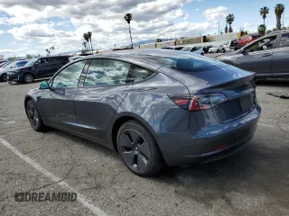 2022 Tesla Model 3 Long Range with VIN 5YJ3E1EB5NF271921, listed as a Copart auction lot 51012635 with 47,761 mi miles and Salvage Title. Bid and sale history available at carsss.com. Image 2.