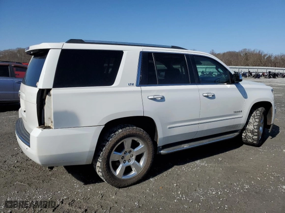 2015 Chevrolet Tahoe LTZ with VIN 1GNSKCKC9FR666040, listed as a Copart auction lot 44431875 with 233,166 mi miles and Salvage Title. Bid and sale history available at carsss.com. Image 3.