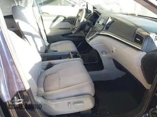 2019 Honda Odyssey LX with VIN 5FNRL6H2XKB124126, listed as a IAAI auction lot 40859906 with 24,369 mi miles and . Bid and sale history available at DreamBid. Image 5.