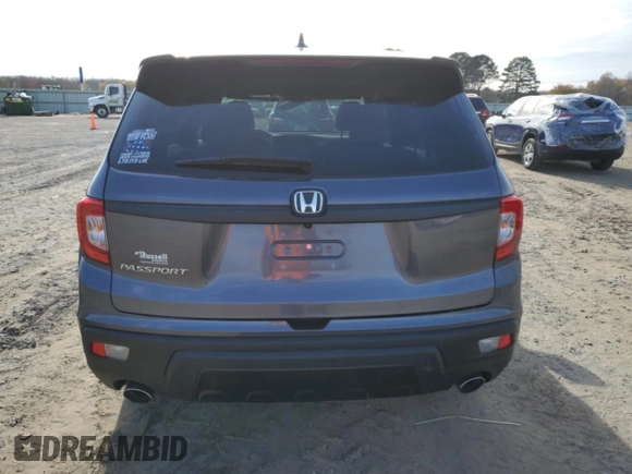 2021 Honda Passport EX-L with VIN 5FNYF7H54MB011715, listed as a Copart auction lot 84494244 with 33,264 mi miles and Salvage Title. Bid and sale history available at carsss.com. Image 6.