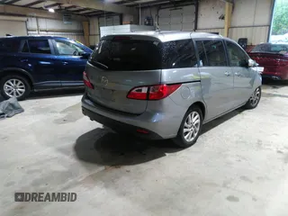 2013 Mazda 5 Sport with VIN JM1CW2BL5D0156684, listed as a IAAI auction lot 41966696 with 121,654 mi miles and . Bid and sale history available at DreamBid. Image 4.