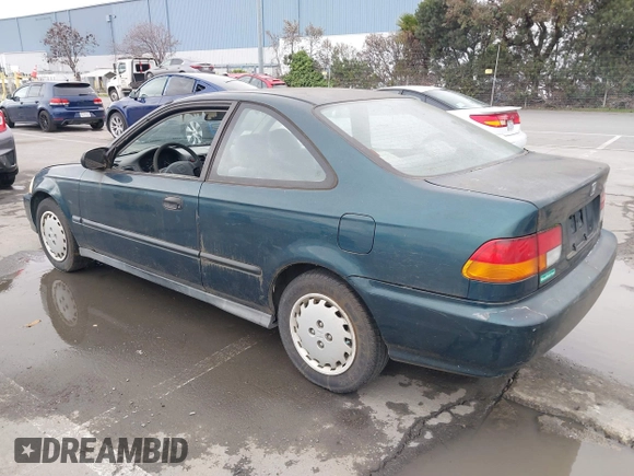 1997 Honda Civic DX with VIN 1HGEJ6128VL023684, listed as a IAAI auction lot 41502999 with 140,871 mi miles. Bid and sale history available at carsss.com. Image 3.