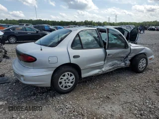 2000 Pontiac Sunfire SE z VIN 1G2JB5249Y7115960, wystawiony jako Copart lot #65038974 z przebiegiem 112 487 mil mil oraz Szkody całkowita. Historia ofert i sprzedaży dostępna na DreamBid. Obrazek 3.