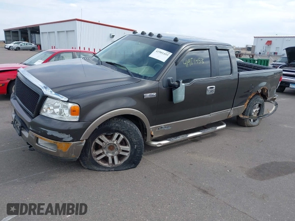 2005 Ford F-150 XLT with VIN 1FTPX14515NA43732, listed as a IAAI auction lot 41901453 with 216,729 mi miles. Bid and sale history available at carsss.com. Image 2.