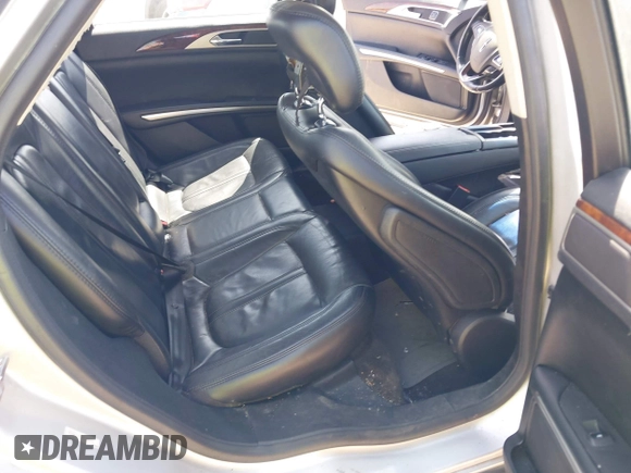 2015 Lincoln MKZ with VIN 3LN6L2J97FR608175, listed as a IAAI auction lot 41860094 with 196,965 mi miles and . Bid and sale history available at DreamBid. Image 8.