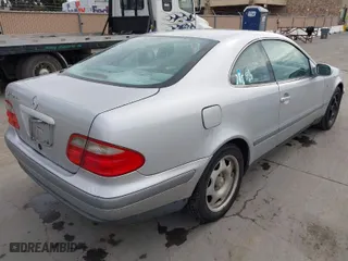 1998 Mercedes-Benz CLK-Class with VIN WDBLJ65G7WF030460, listed as a IAAI auction lot 41633288 with 327,848 mi miles. Bid and sale history available at carsss.com. Image 4.