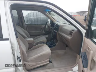 2001 Isuzu Rodeo S with VIN 4S2DM58WX14315138, listed as a IAAI auction lot 41535619 with 217,960 mi miles and . Bid and sale history available at DreamBid. Image 5.
