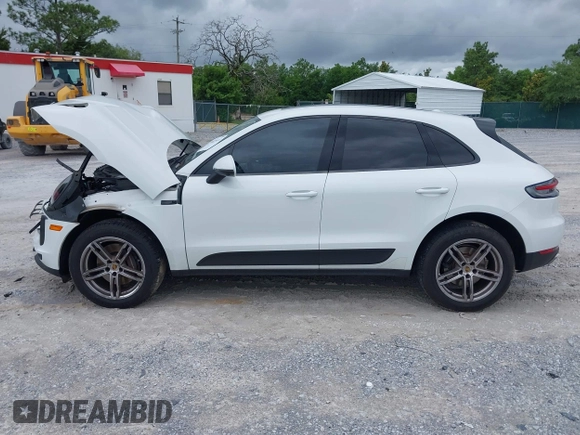 2021 Porsche Macan with VIN WP1AA2A52MLB06086, listed as a IAAI auction lot 39423611 with 56,559 mi miles and . Bid and sale history available at DreamBid. Image 14.