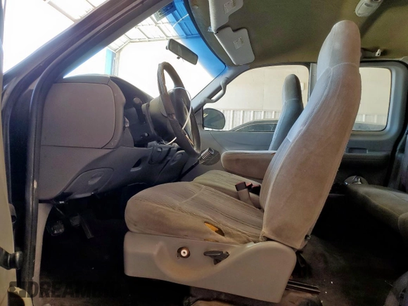 1998 Ford F-150 XL with VIN 1FTZX0725WKB83760, listed as a Copart auction lot 60988225 with 243,361 mi miles and Salvage title. Bid and sale history available at DreamBid. Image 7.