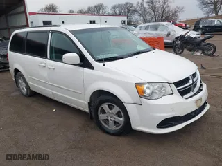 2012 Dodge Grand Caravan SXT with VIN 2C4RDGCG8CR361080, listed as a IAAI auction lot 41216245 with 229,873 mi miles. Bid and sale history available at carsss.com. Image 1.