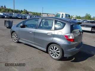 2013 Honda Fit Sport with VIN JHMGE8H58DC045219, listed as a IAAI auction lot 42057466 with 121,837 mi miles. Bid and sale history available at carsss.com. Image 3.