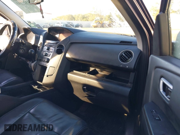 2015 Honda Pilot EX-L with VIN 5FNYF4H59FB060023, listed as a IAAI auction lot 41327793 with 197,981 mi miles and . Bid and sale history available at carsss.com. Image 5.