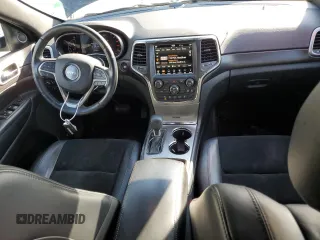 2018 Jeep Grand Cherokee Laredo E with VIN 1C4RJEAGXJC246874, listed as a Copart auction lot 56722005 with 101,493 mi miles and Salvage title. Bid and sale history available at DreamBid. Image 8.