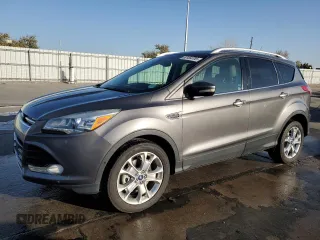 2014 Ford Escape Titanium with VIN 1FMCU9J93EUA77136, listed as a Copart auction lot 52454785 with 154,607 mi miles and Salvage Title. Bid and sale history available at carsss.com. Image 1.