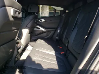 2023 BMW X6 xDrive40i z VIN 5UXCY6C04P9P46153, wystawiony jako Copart lot #81151634 z przebiegiem Nie podano mil oraz Szkoda całkowita • Salvage title. Historia ofert i sprzedaży dostępna na DreamBid. Obrazek 11.