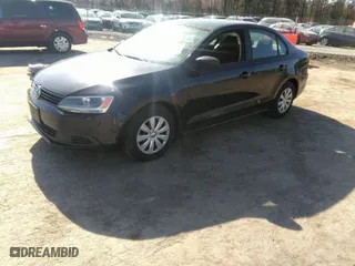 2014 Volkswagen Jetta Sedan S with VIN 3VW2K7AJ5EM310715, listed as a IAAI auction lot 41843290 with 257,801 mi miles. Bid and sale history available at carsss.com. Image 2.