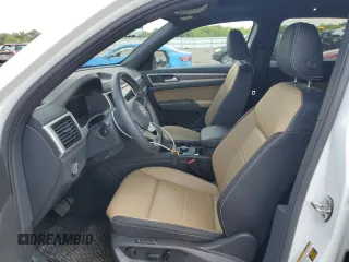 2023 Volkswagen Atlas SEL with VIN 1V2BE2CA4PC216788, listed as a Copart auction lot 65115764 with 13,033 mi miles and Salvage title. Bid and sale history available at DreamBid. Image 7.
