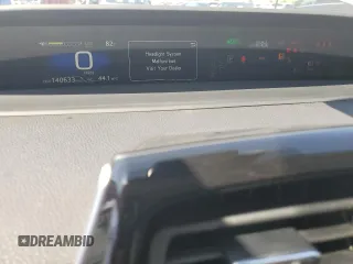 2022 Toyota Prius L Eco z VIN JTDKAMFU2N3176948, wystawiony jako Copart lot #52086435 z przebiegiem 140 633 mil mil oraz Szkoda całkowita • Salvage title. Historia ofert i sprzedaży dostępna na DreamBid. Obrazek 9.
