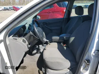 2004 Ford Focus with VIN 3FAFP37Z74R121213, listed as a Copart auction lot 53339645 with 65,590 mi miles and Clean title. Bid and sale history available at DreamBid. Image 7.