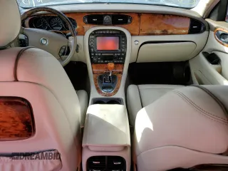 2006 Jaguar XJ Vanden Plas with VIN SAJWA82B66SG50019, listed as a Copart auction lot 76405544 with 0 mi miles and Non Repairable. Bid and sale history available at carsss.com. Image 8.