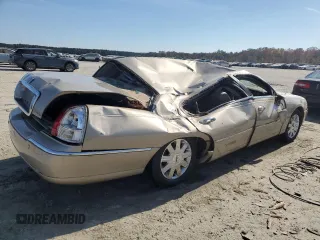 2004 Lincoln Town Car Ultimate L z VIN 1LNHM85W94Y672371, wystawiony jako Copart lot #77752284 z przebiegiem 140 776 mil mil oraz Nie do naprawy • Non repairable. Historia ofert i sprzedaży dostępna na DreamBid. Obrazek 3.