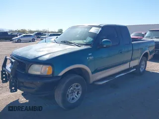 1997 Ford F-150 XL with VIN 1FTEX18LXVKB64986, listed as a IAAI auction lot 41901924 with 224,288 mi miles. Bid and sale history available at carsss.com. Image 2.