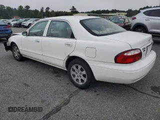 2000 Mazda 626 LX with VIN 1YVGF22CXY5112958, listed as a Copart auction lot 72740904 with 111,581 mi miles and Clean Title. Bid and sale history available at carsss.com. Image 2.