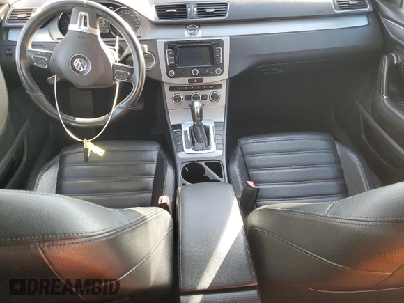 2013 Volkswagen CC Lux with VIN WVWRP7AN5DE525411, listed as a Copart auction lot 77148844 with 117,652 mi miles and Salvage Title. Bid and sale history available at DreamBid. Image 8.