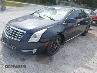 2013 Cadillac XTS Premium with VIN 2G61S5S31D9196354, listed as a IAAI auction lot 41905983 with 197,605 mi miles. Bid and sale history available at carsss.com. Image 2.