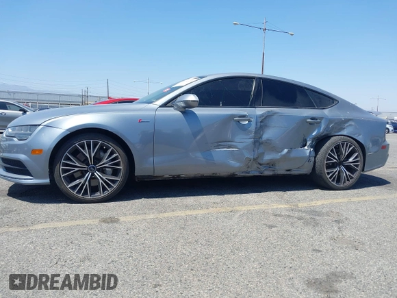 2018 Audi A7 Premium Plus z VIN WAUW3AFC1JN026763, wystawiony jako IAAI lot #42359297 z przebiegiem 108 937 mil mil oraz . Historia ofert i sprzedaży dostępna na DreamBid. Obrazek 20.