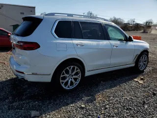 2019 BMW X7 xDrive40i with VIN 5UXCW2C50KL086103, listed as a Copart auction lot 48360425 with 151,031 mi miles and Salvage Title. Bid and sale history available at carsss.com. Image 3.