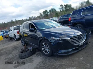 2018 Mazda CX-9 Touring with VIN JM3TCBCY0J0205750, listed as a IAAI auction lot 41857575 with 72,384 mi miles. Bid and sale history available at carsss.com. Image 1.