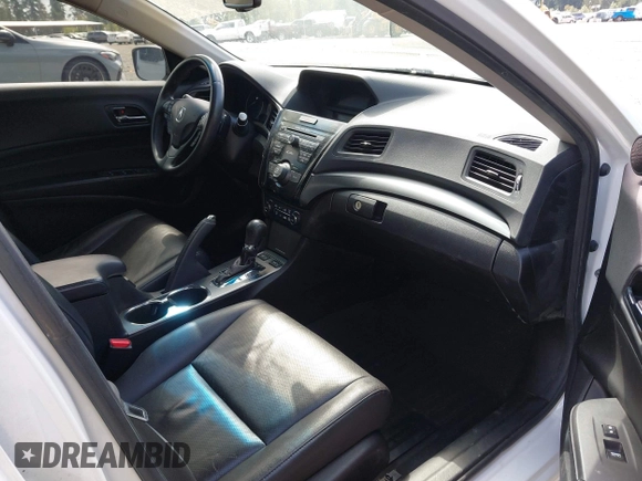 2014 Acura ILX Premium with VIN 19VDE1F54EE010386, listed as a IAAI auction lot 42587225 with 145,613 mi miles and . Bid and sale history available at DreamBid. Image 5.