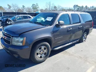2010 Chevrolet Suburban LS with VIN 1GNUCHE07AR125498, listed as a IAAI auction lot 41427576 with 266,150 mi miles. Bid and sale history available at carsss.com. Image 2.
