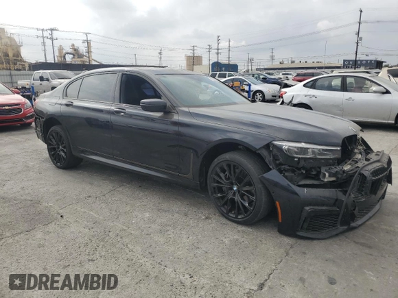 2022 BMW 7 Series 740i with VIN WBA7T2C04NCJ31237, listed as a Copart auction lot 76627214 with 44,630 mi miles and Salvage Title. Bid and sale history available at carsss.com. Image 4.