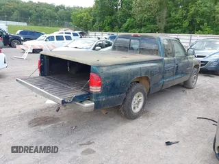 1998 Dodge Dakota SLT with VIN 1B7GL22X4WS554408, listed as a IAAI auction lot 42202021 with 147,765 mi miles. Bid and sale history available at carsss.com. Image 4.