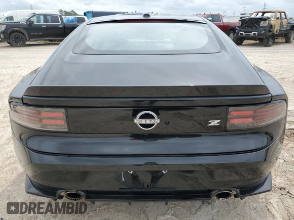 2023 Nissan Z Performance с VIN JN1BZ4BH9PM310761, выставлен на аукционе Copart как лот 54865925 с пробегом 6 541 миль миль и Списание • Salvage title. История ставок и продаж доступна на DreamBid. Изображение 6.
