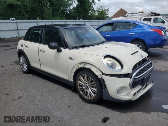 2017 MINI Hardtop 4 Door Cooper S with VIN WMWXU3C33H2F49587, listed as a Copart auction lot 60482365 with 102,782 mi miles and Salvage title. Bid and sale history available at DreamBid. Image 4.